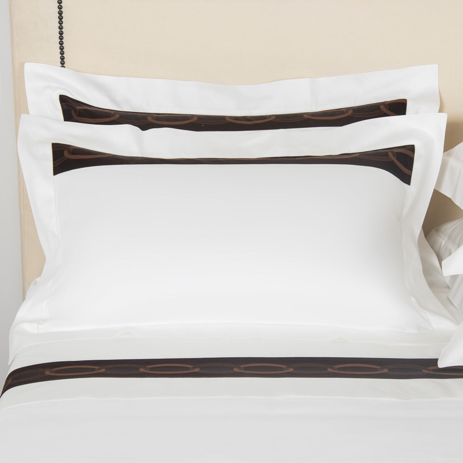 will a queen pillow fit in a standard sham